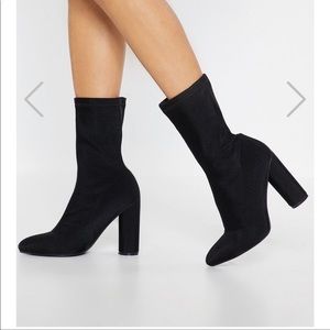 Black heeled sock boots